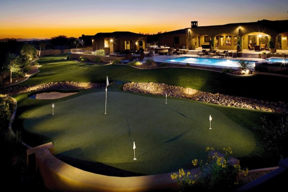 Southwest Greens of Western Canada artificial golf green with sand trap at luxury home